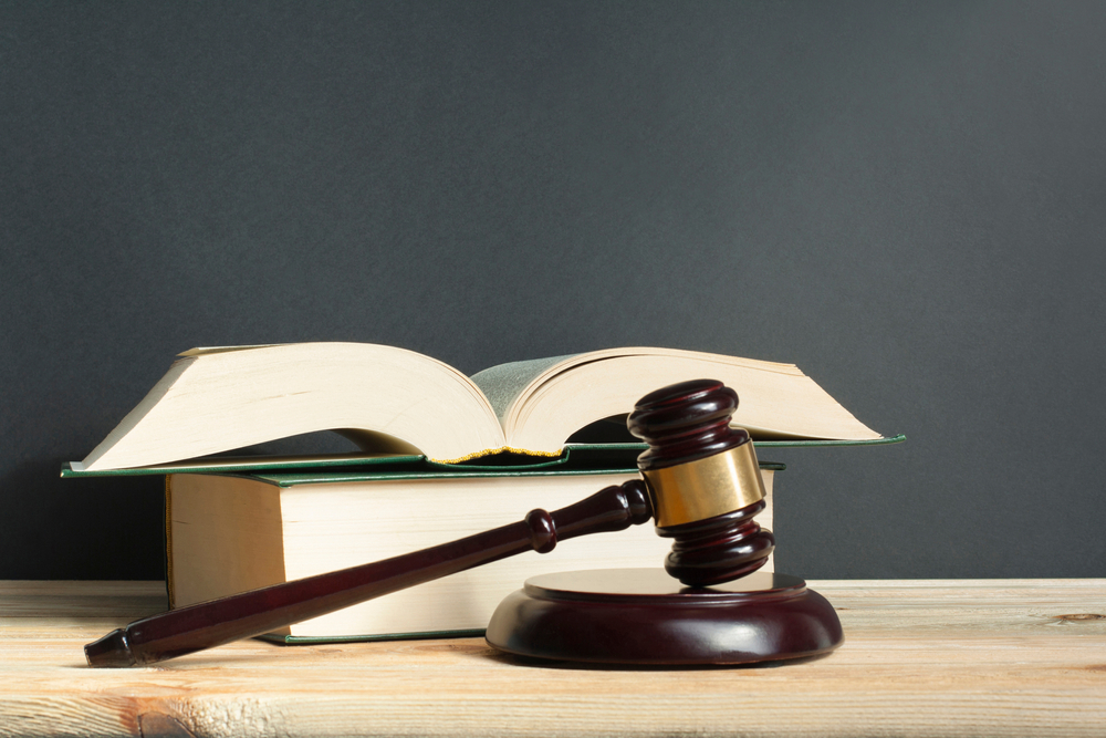 Justice,Books,With,Wooden,Judges,Gavel,On,Table,In,A